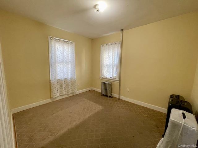 50-44 39th Street Queens, NY 11104 - Photo 2 of 15 a view of an empty room with a window