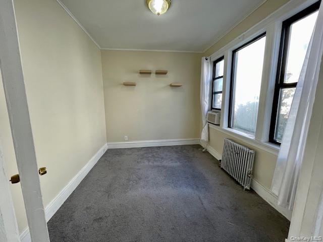 50-44 39th Street Queens, NY 11104 - Photo 7 of 15 an empty room with windows