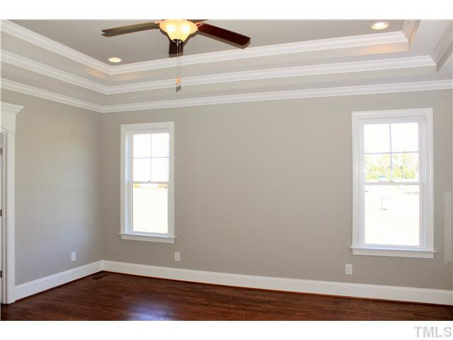 2613 Packhouse Road Zebulon, NC 27597 - Photo 15 of 25 Triple trey ceiling recessed lighting twin doors to spar. Master Bedroom