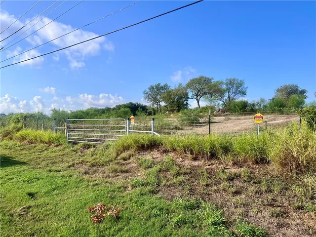 a view of a golf course with a lake