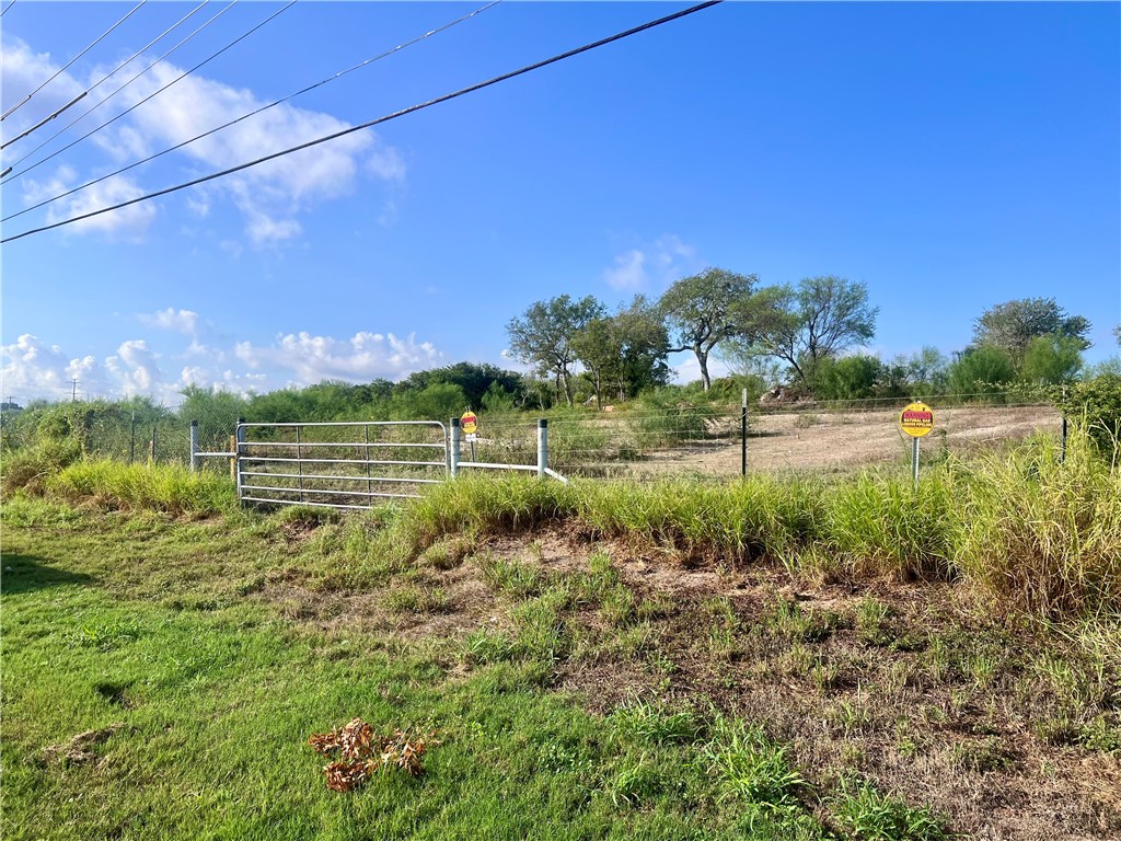 4609 Sharpsburg Road Corpus Christi, TX 78410 - Photo 4 of 4 a view of a golf course with a lake