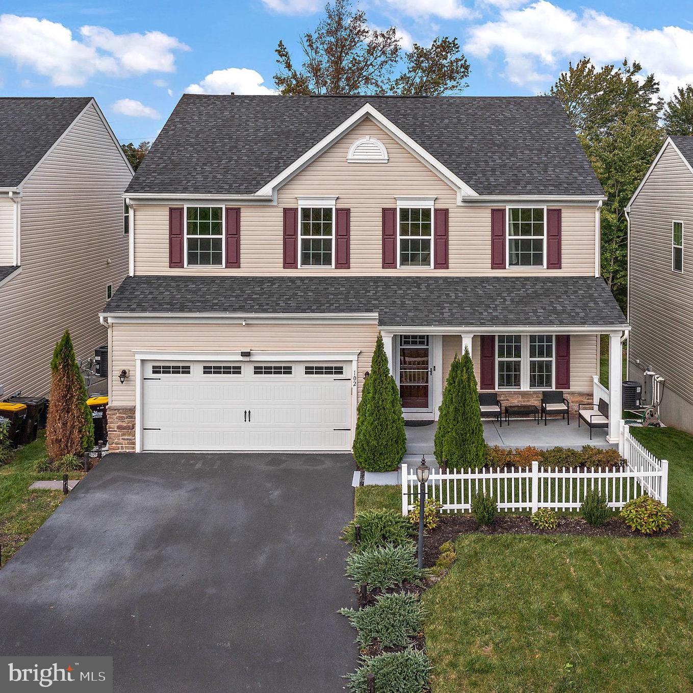 102 Pixie Moss Road Pottstown, PA 19464 - Photo 1 of 45 a front view of a house with a yard