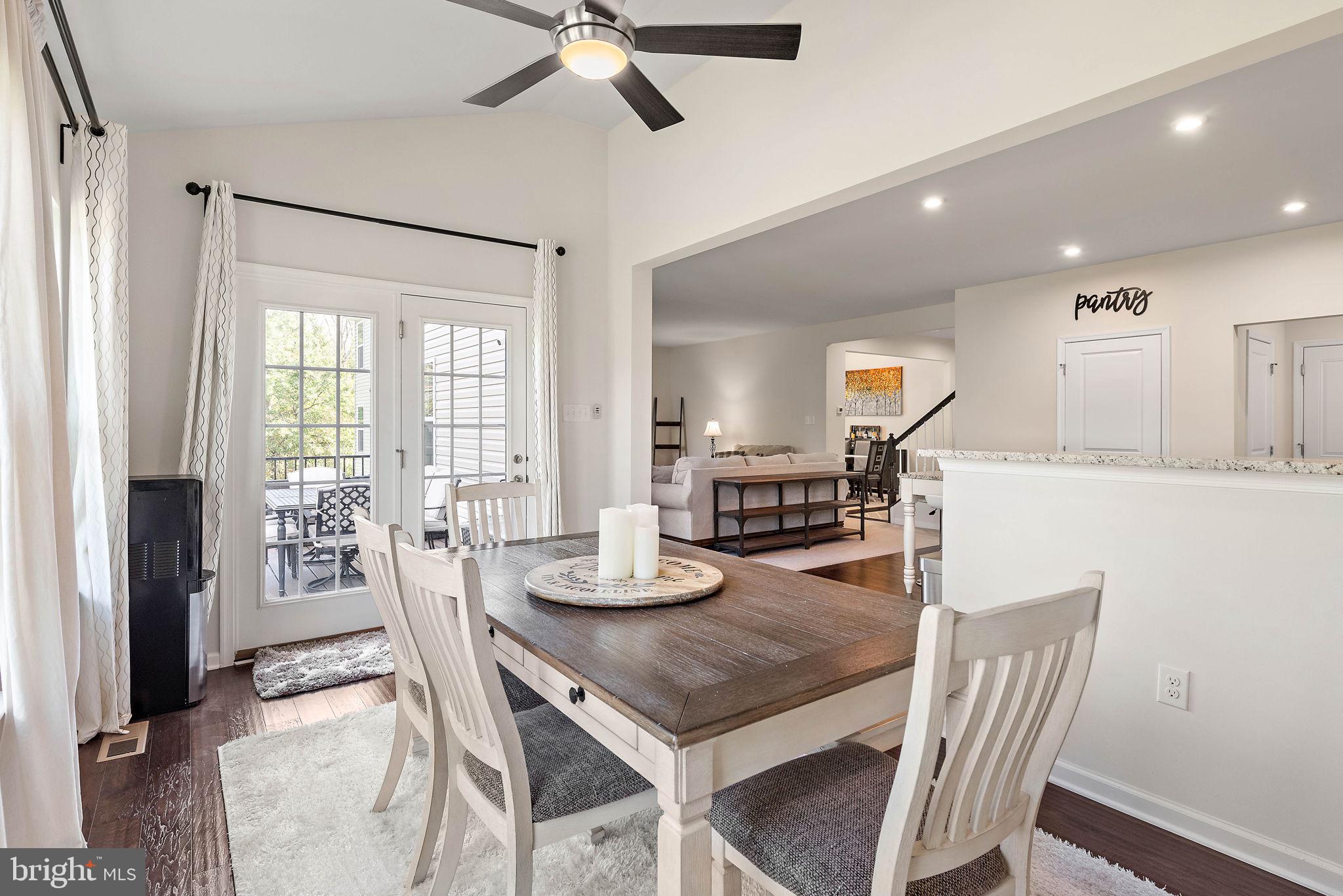 102 Pixie Moss Road Pottstown, PA 19464 - Photo 11 of 45 a view of a dining room with furniture window and wooden floor