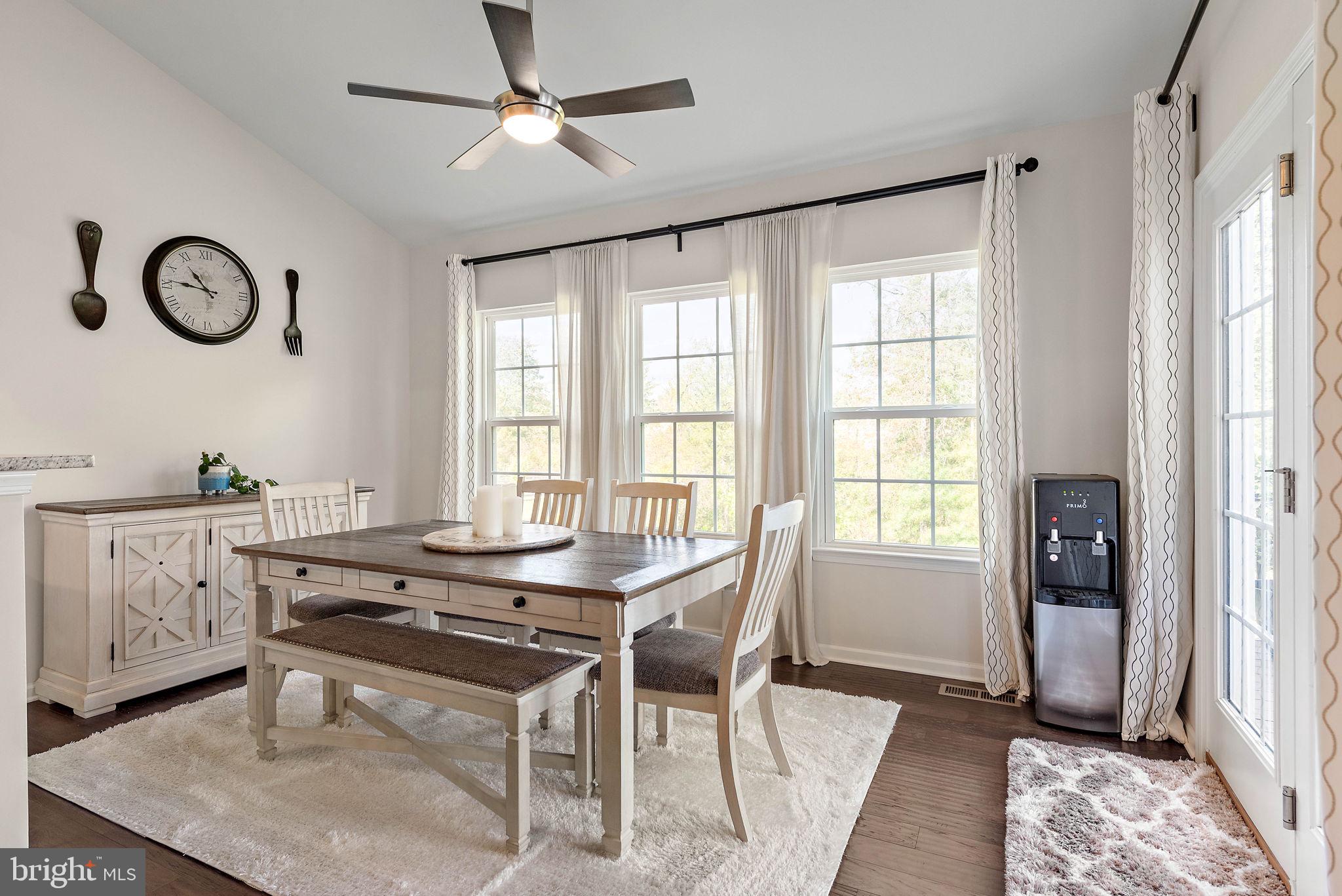 102 Pixie Moss Road Pottstown, PA 19464 - Photo 12 of 45 a dining room with wooden floor and a window