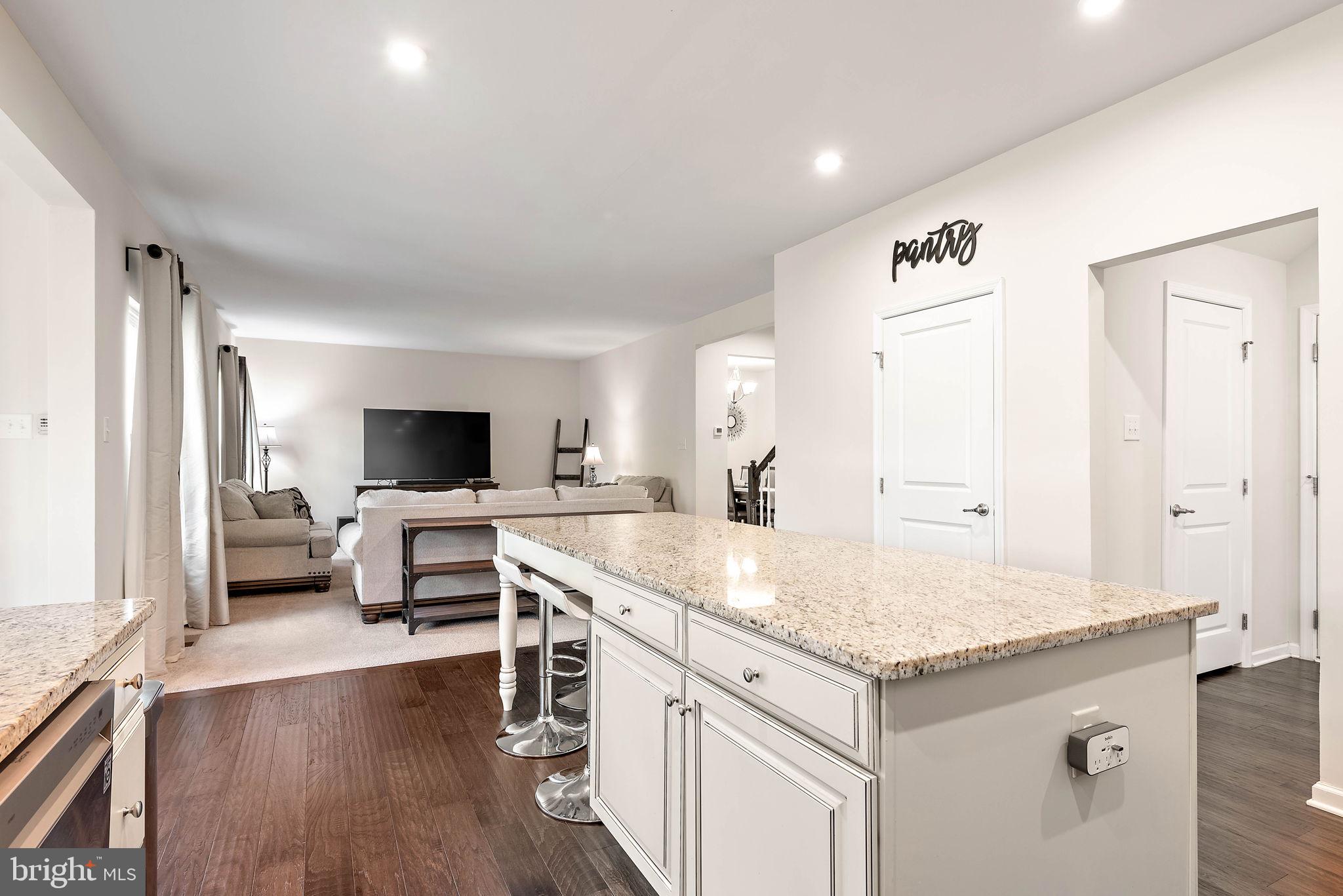 102 Pixie Moss Road Pottstown, PA 19464 - Photo 13 of 45 a living room with furniture and a flat screen tv