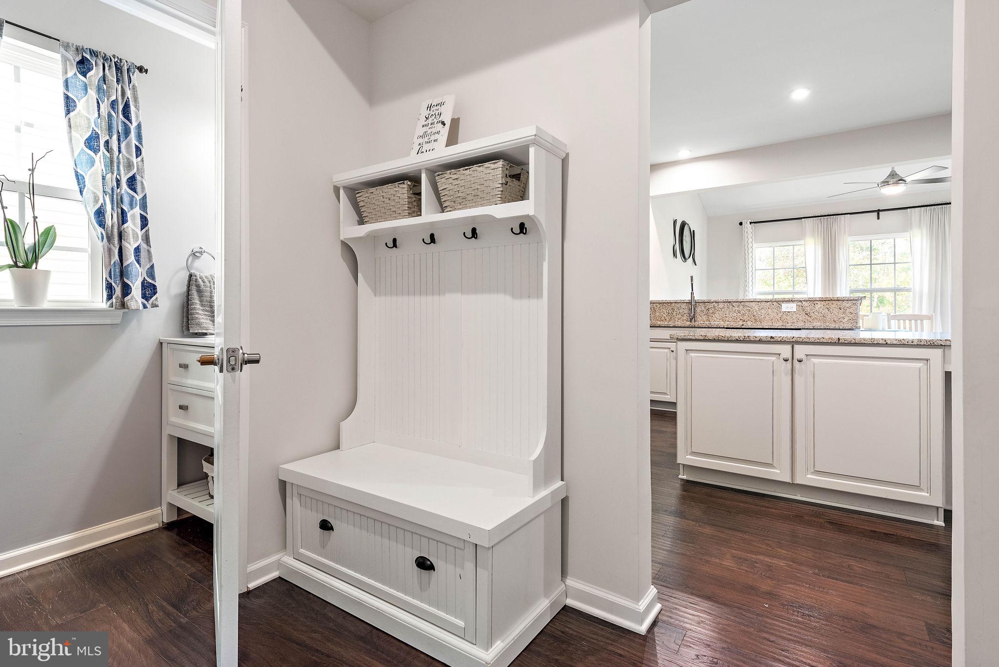 102 Pixie Moss Road Pottstown, PA 19464 - Photo 16 of 45 a kitchen with a refrigerator a sink and wooden floor