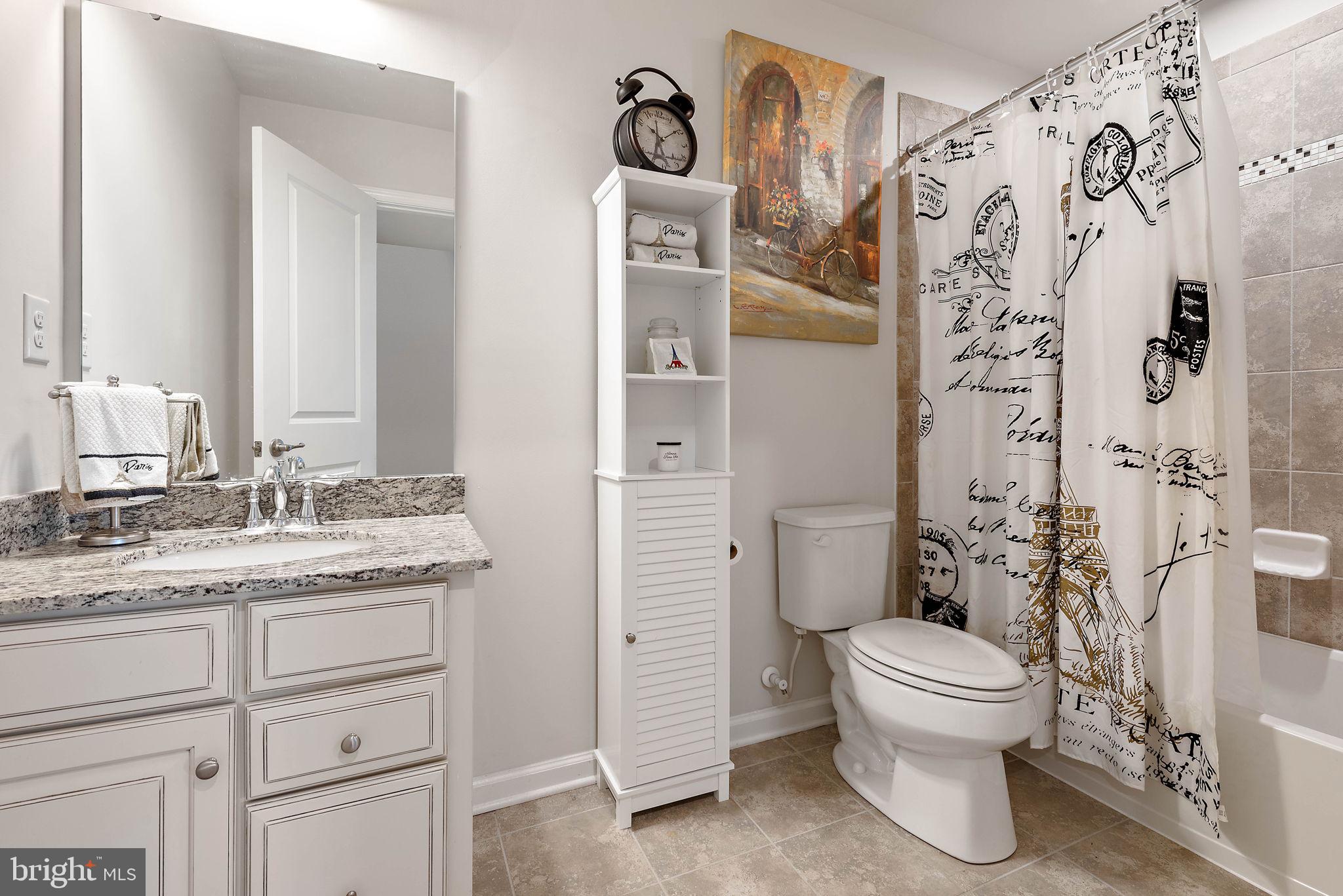 102 Pixie Moss Road Pottstown, PA 19464 - Photo 18 of 45 a bathroom with a granite countertop toilet sink and mirror