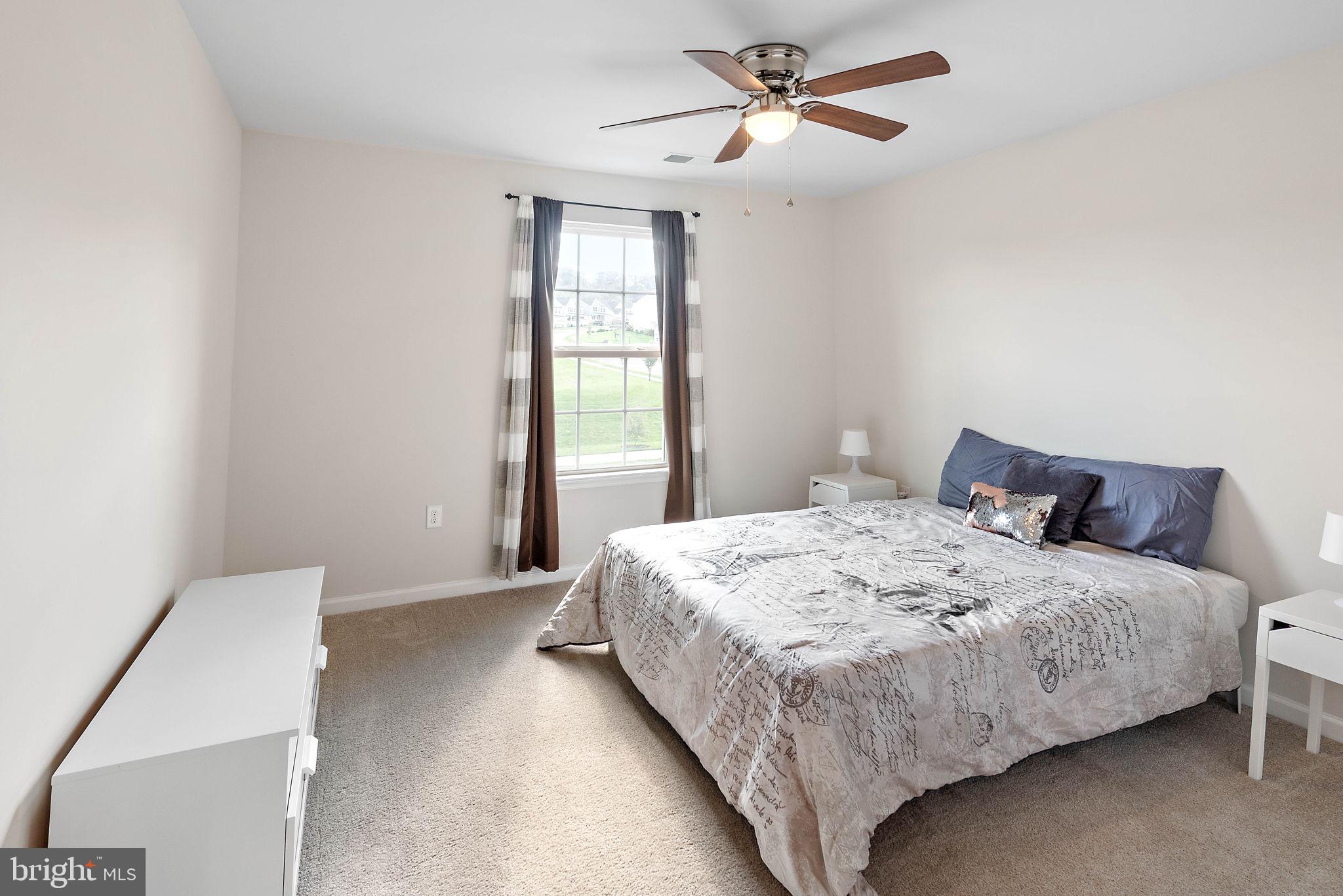 102 Pixie Moss Road Pottstown, PA 19464 - Photo 25 of 45 a bedroom with a bed and window
