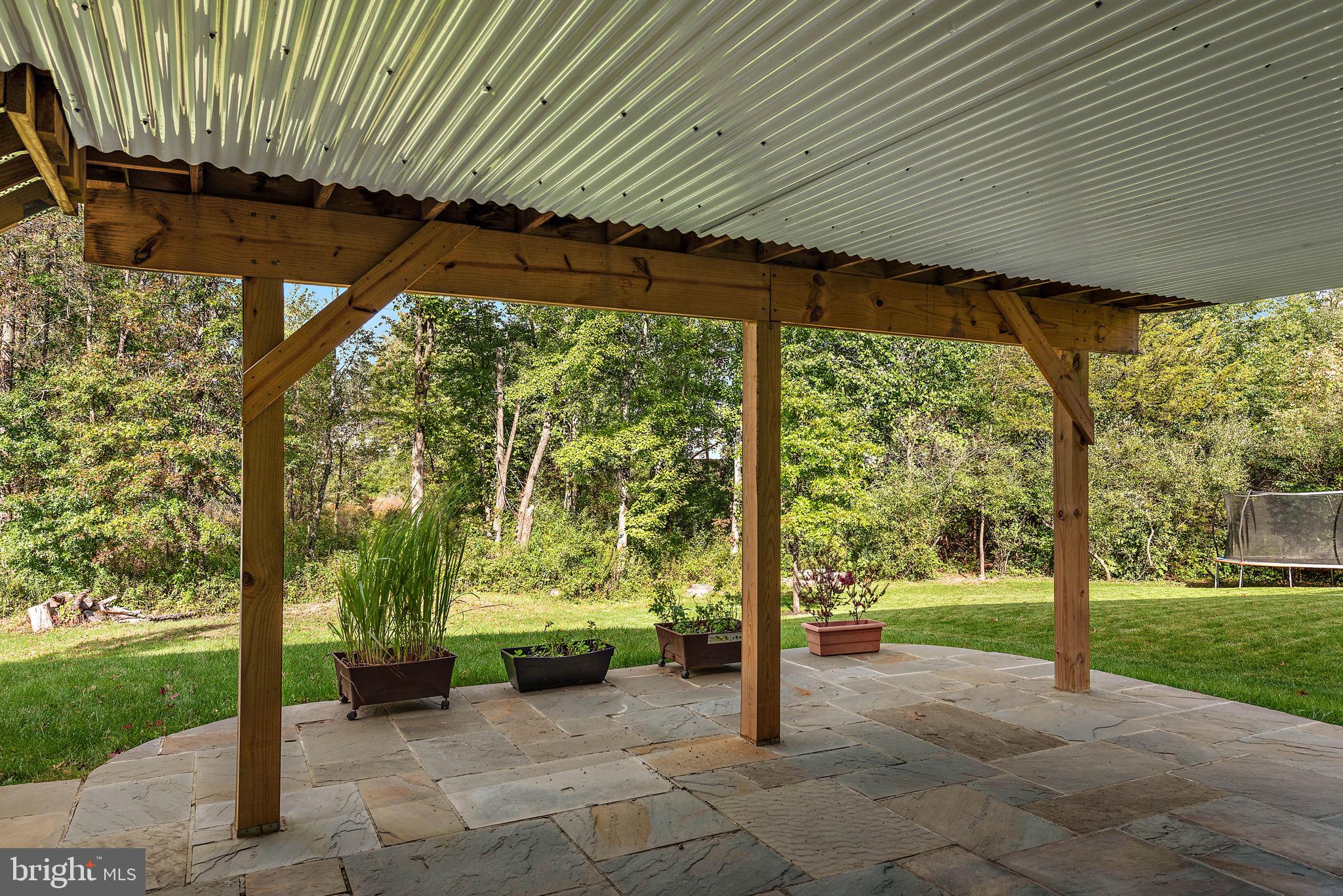 102 Pixie Moss Road Pottstown, PA 19464 - Photo 32 of 45 a view of a porch with a backyard