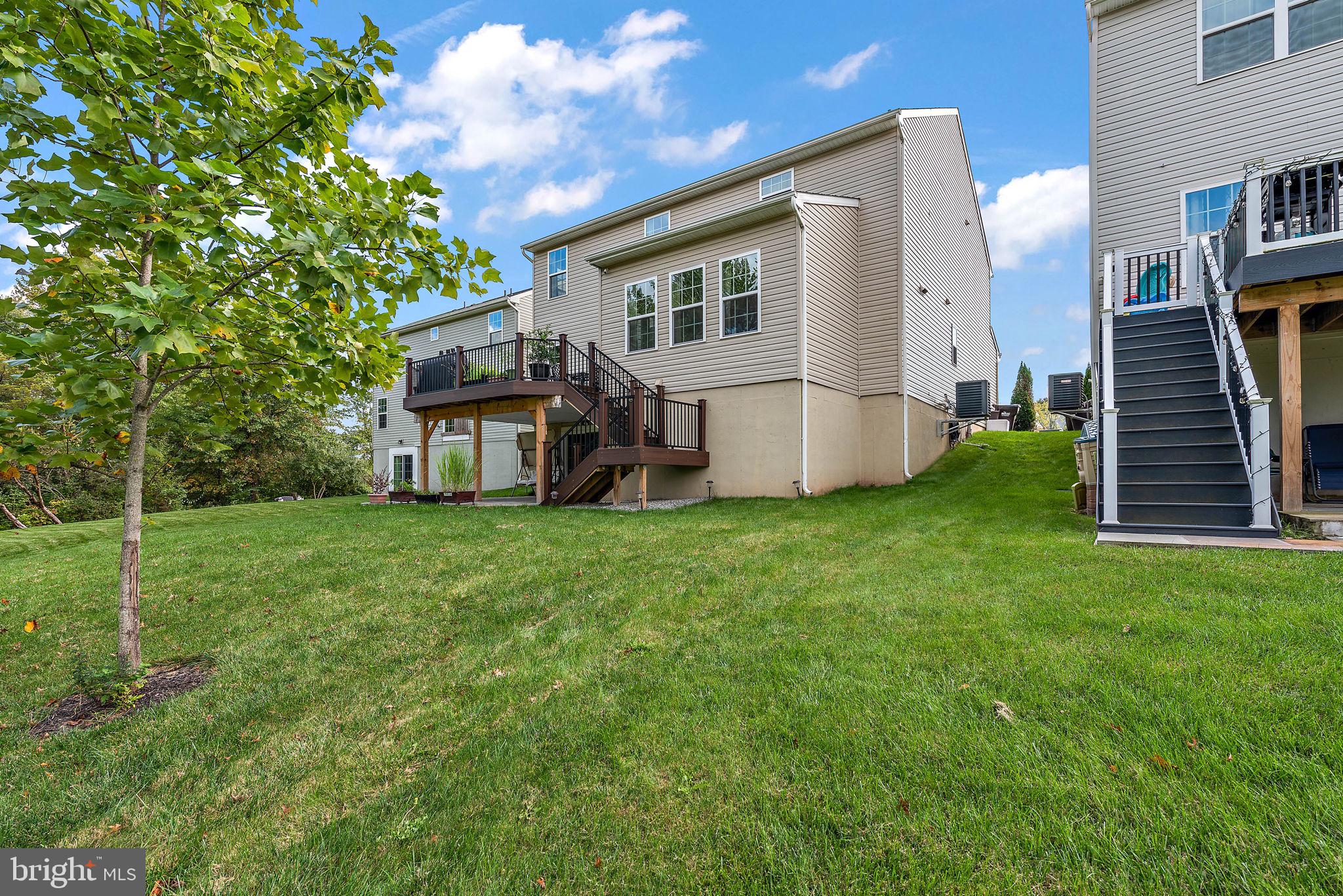 102 Pixie Moss Road Pottstown, PA 19464 - Photo 36 of 45 a view of a house with backyard and garden