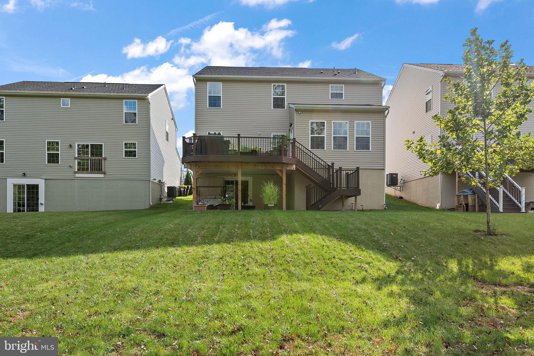 102 Pixie Moss Road Pottstown, PA 19464 - Photo 37 of 45 a view of a house with a back yard