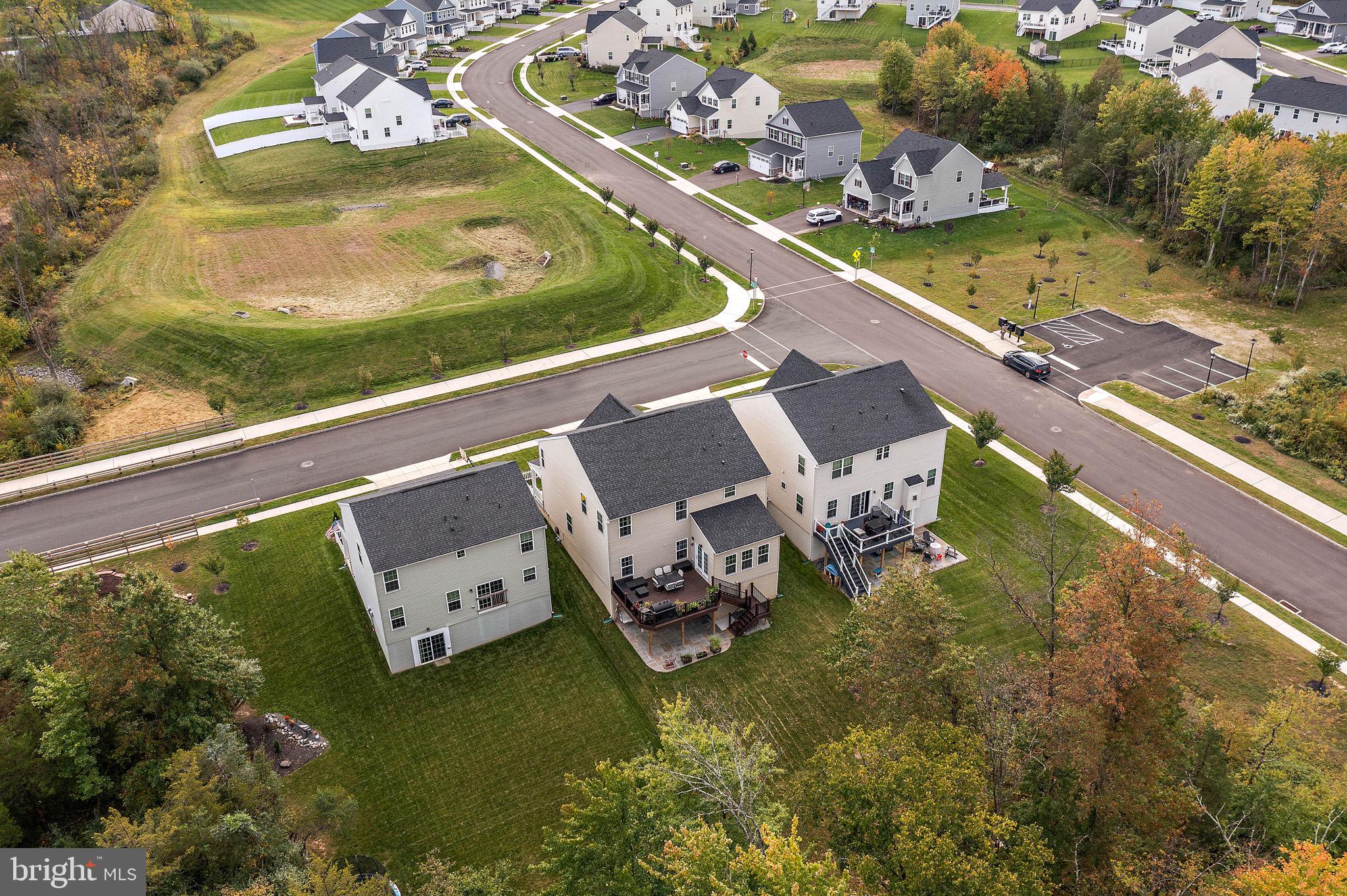 102 Pixie Moss Road Pottstown, PA 19464 - Photo 43 of 45 an aerial view of a house a yard and a garden