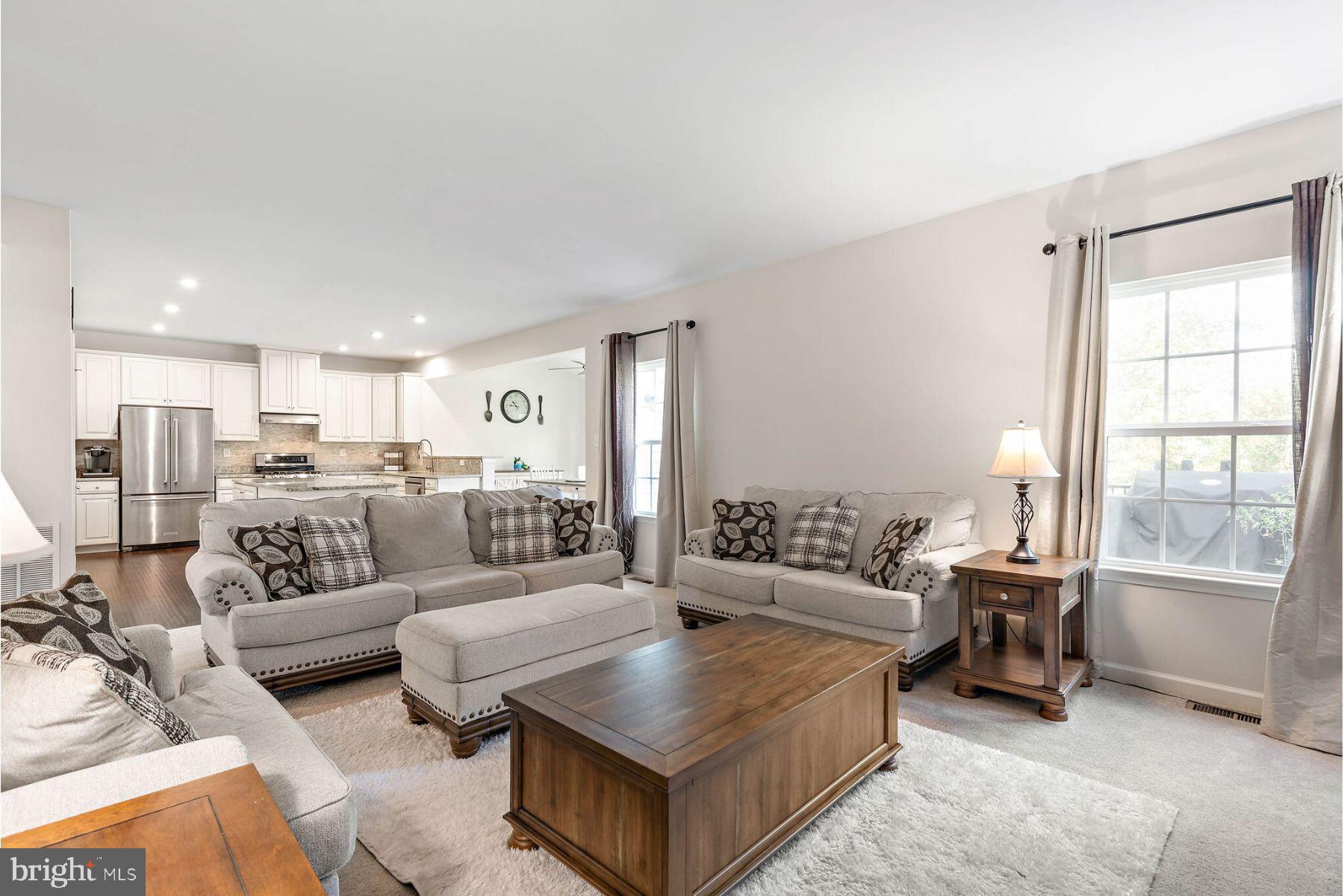 102 Pixie Moss Road Pottstown, PA 19464 - Photo 7 of 45 a living room with furniture and a large window