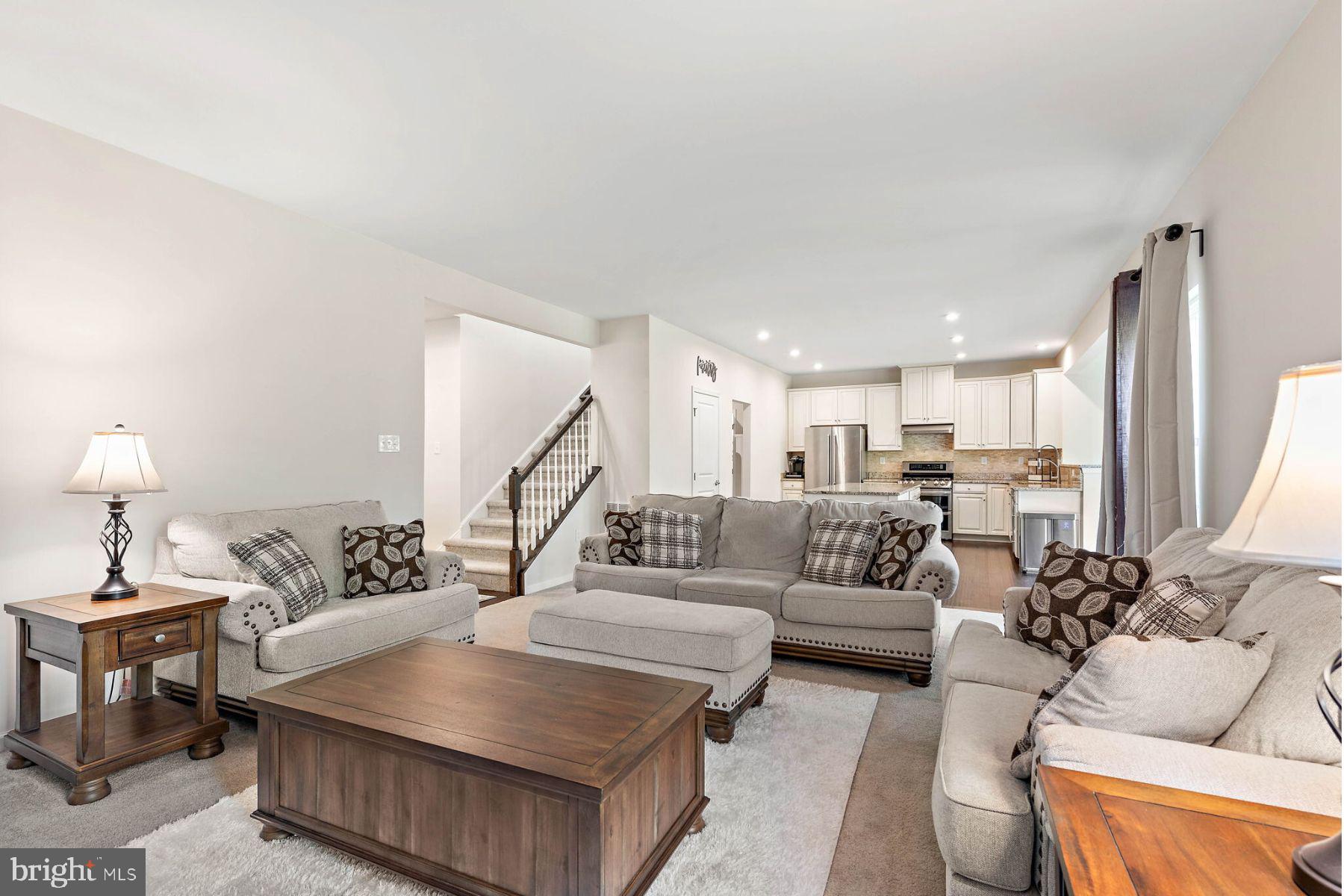 102 Pixie Moss Road Pottstown, PA 19464 - Photo 8 of 45 a living room with furniture and a table