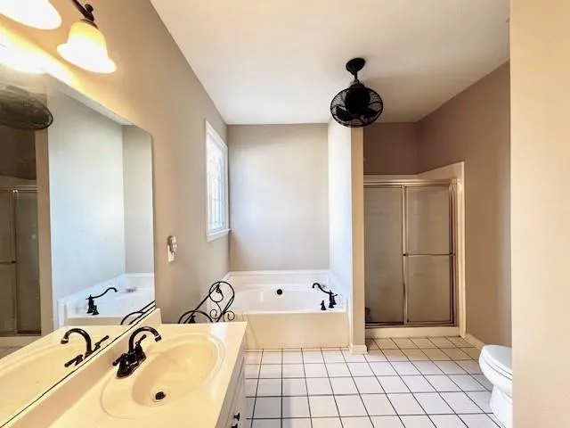 a bathroom with a bathtub and a sink