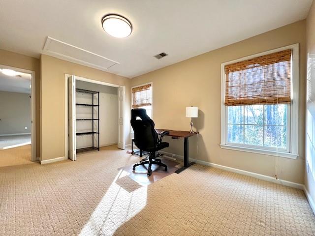 5095 Hampton Bluff Court Roswell, GA 30075 - Photo 18 of 22 a view of a livingroom with workspace and a window