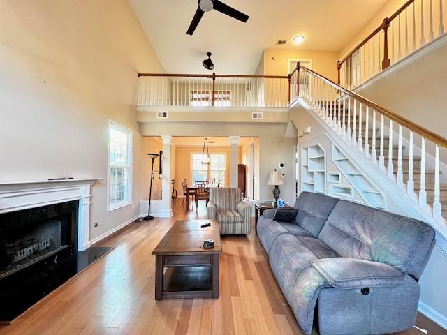 5095 Hampton Bluff Court Roswell, GA 30075 - Photo 4 of 22 a living room with furniture and a fireplace