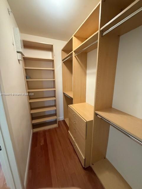785 Crandon Boulevard, Unit 506 Key Biscayne, FL 33149 - Photo 18 of 58 a view of walk in closet with empty racks