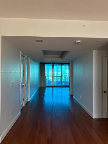 a big room with an outdoor view