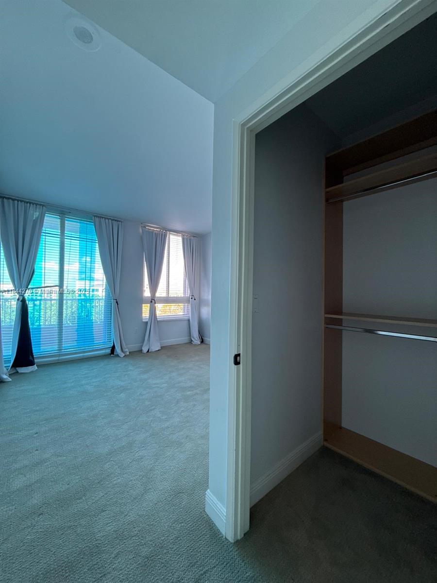 785 Crandon Boulevard, Unit 506 Key Biscayne, FL 33149 - Photo 33 of 58 an empty room with windows