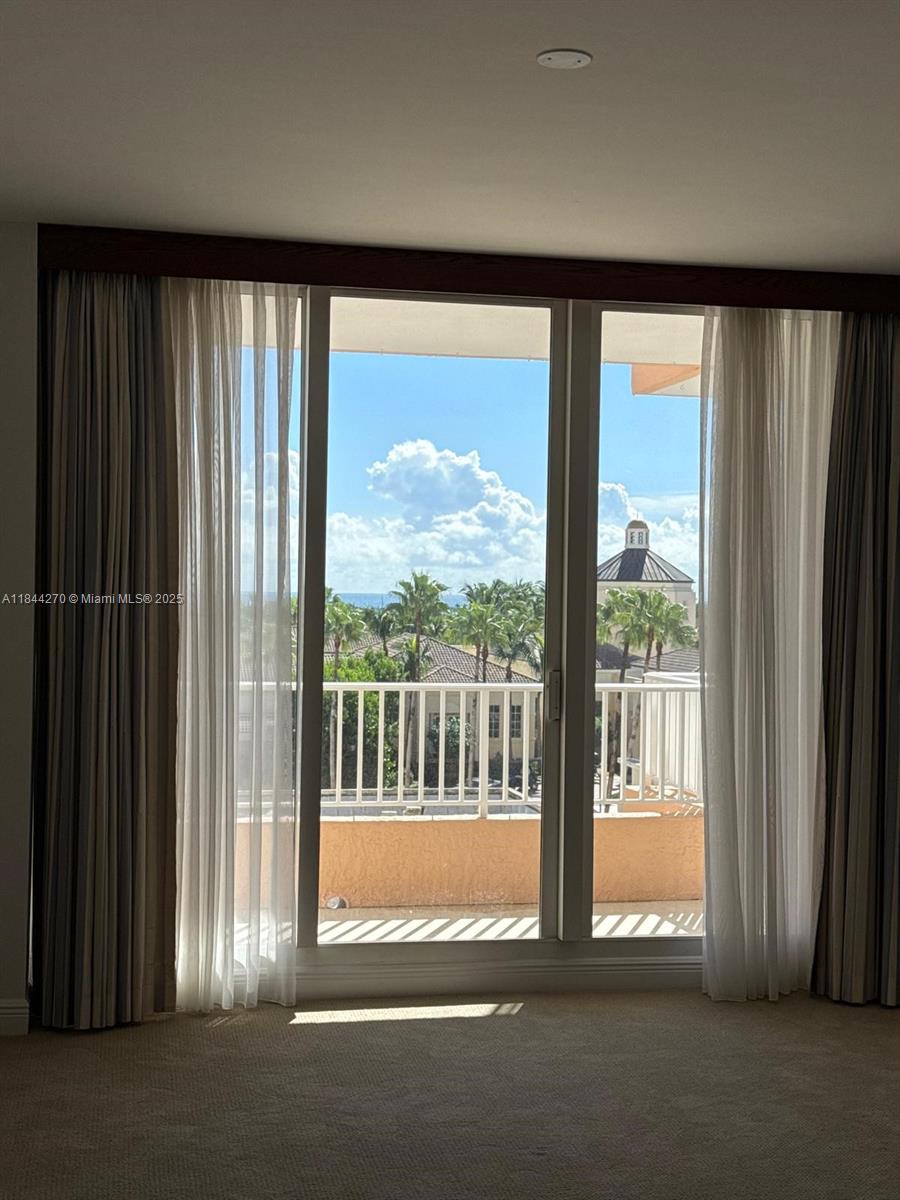 785 Crandon Boulevard, Unit 506 Key Biscayne, FL 33149 - Photo 36 of 58 a view of a large window with an outdoor view