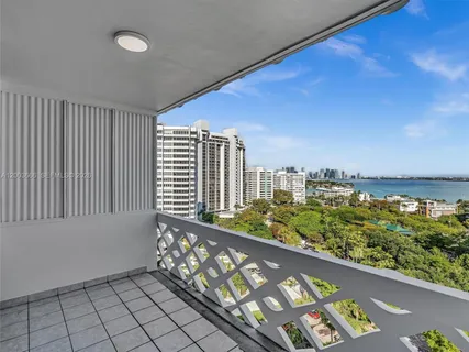 a view of a balcony with an outdoor space