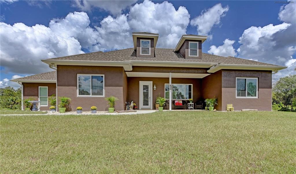 6301 Sheps Island Road Sarasota, FL 34241 - Photo 1 of 1 FRONT EXTERIOR