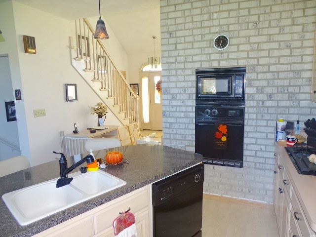 3189 West Forest Road Freeport, IL 61032 - Photo 12 of 22 a living room with furniture and a fireplace