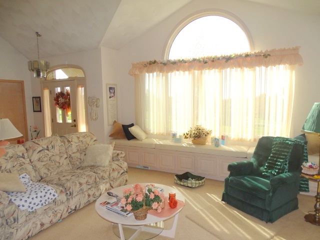 3189 West Forest Road Freeport, IL 61032 - Photo 5 of 22 a living room with furniture and a large window