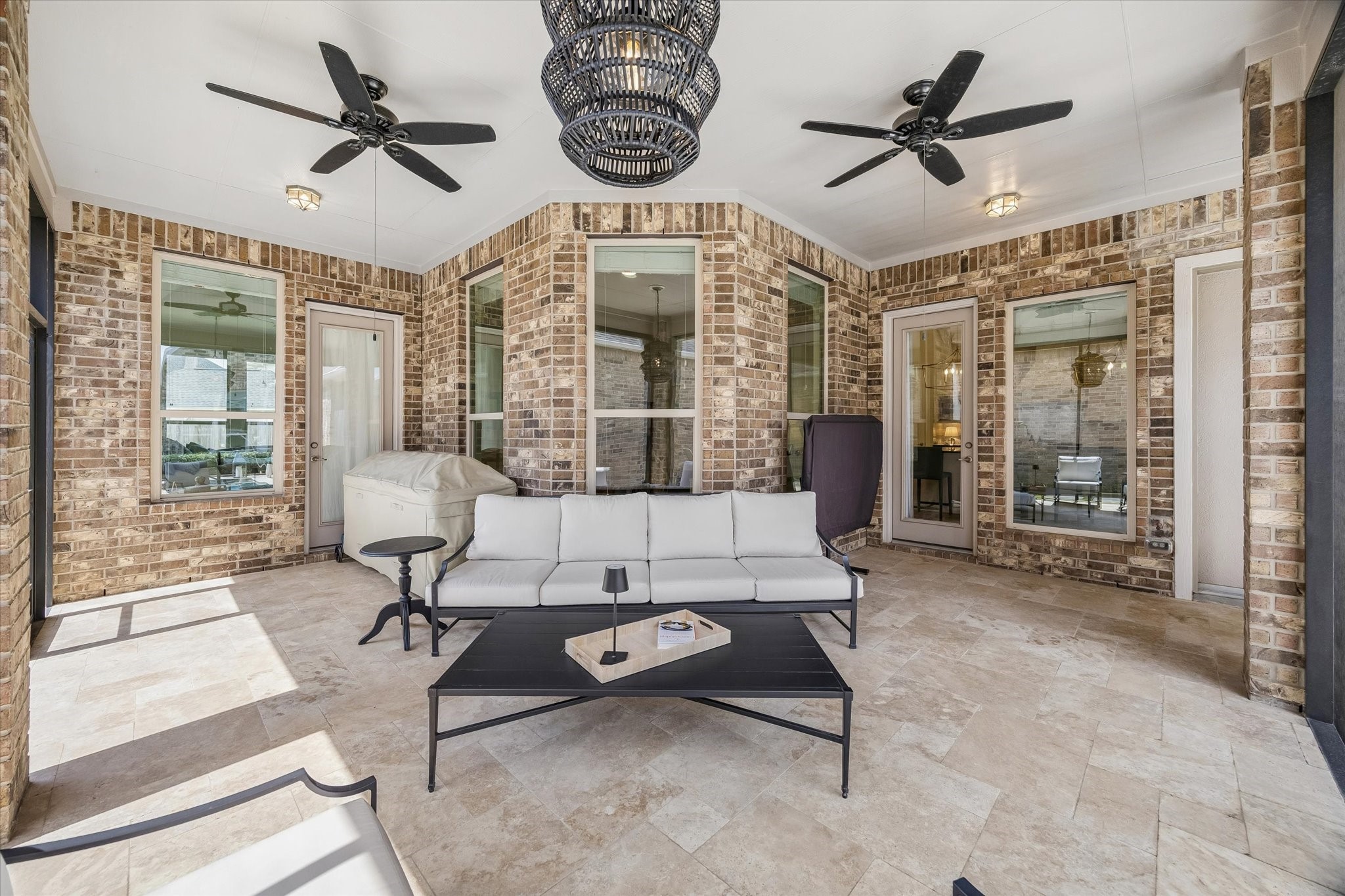 7418 Kearney Hill Lane Spring, TX 77389 - Photo 24 of 35 The primary bedroom enjoys direct access to the screened porch and pool, allowing for late night dips in the pool without disturbing guests or sleeping children.