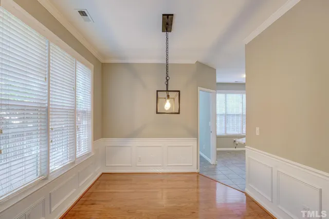 a bathroom with a tub shower and sink