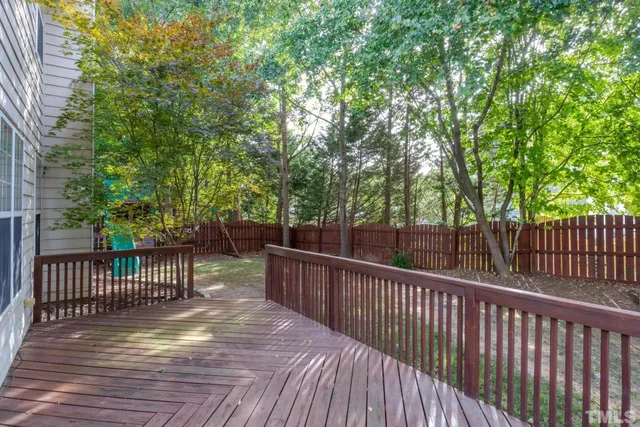 a view of deck with wooden floor and outdoor seating