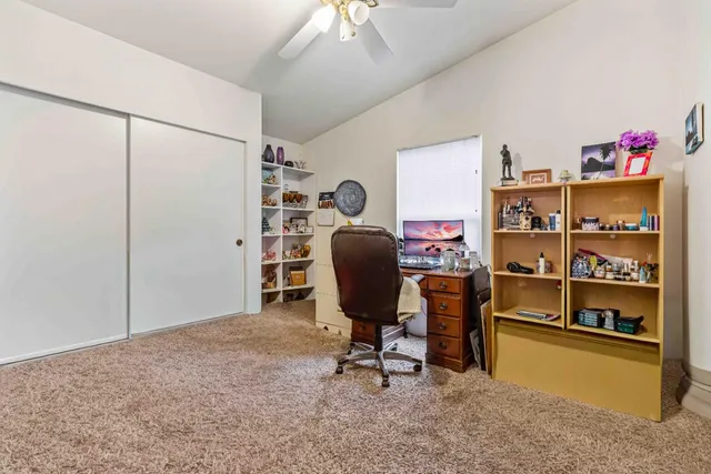 a view of a workspace with furniture