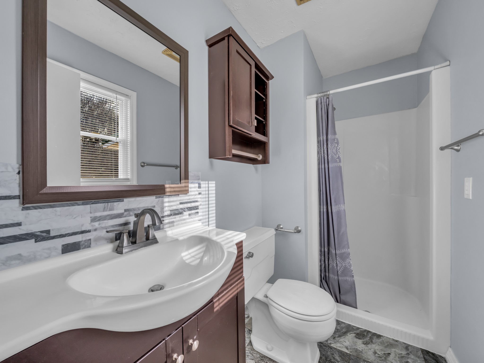 408 Rustling Oaks Drive Waverly, TN 37185 - Photo 13 of 21 a bathroom with a sink toilet and mirror