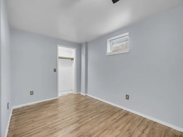 a view of a room that has a window in it