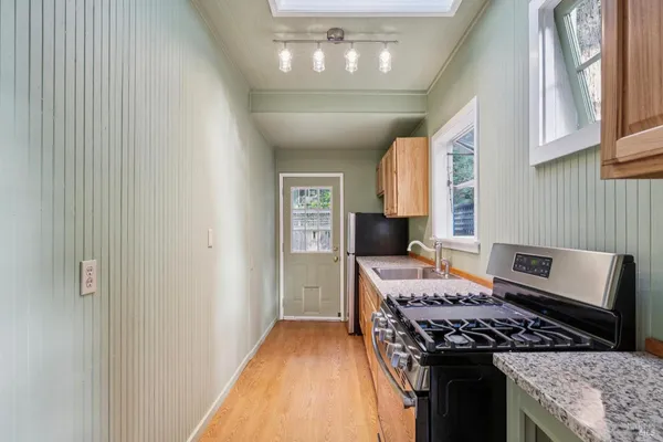 a bathroom with a sink and mirror