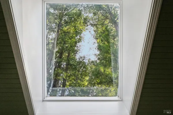 a front view of a house with wooden floor entryway