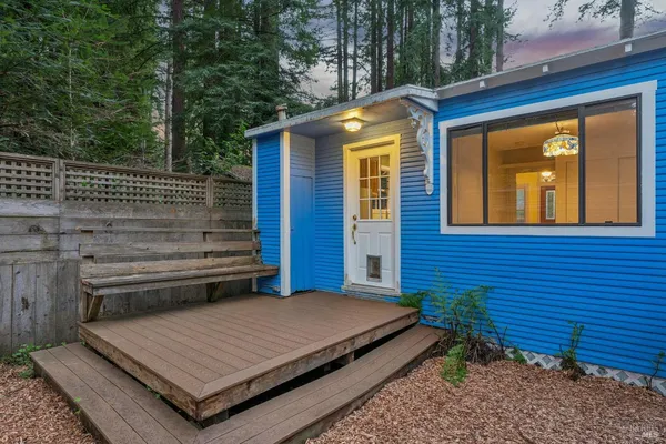 an aerial view of a house with outdoor space