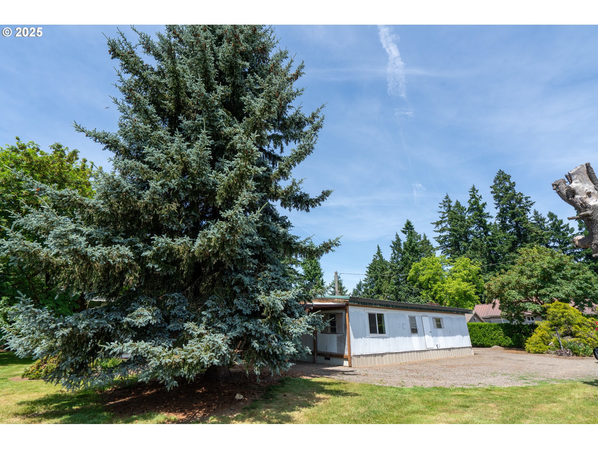 16163 French Prairie Road Northeast Woodburn, OR 97071 - Photo 28 of 47 a view of a house with a yard