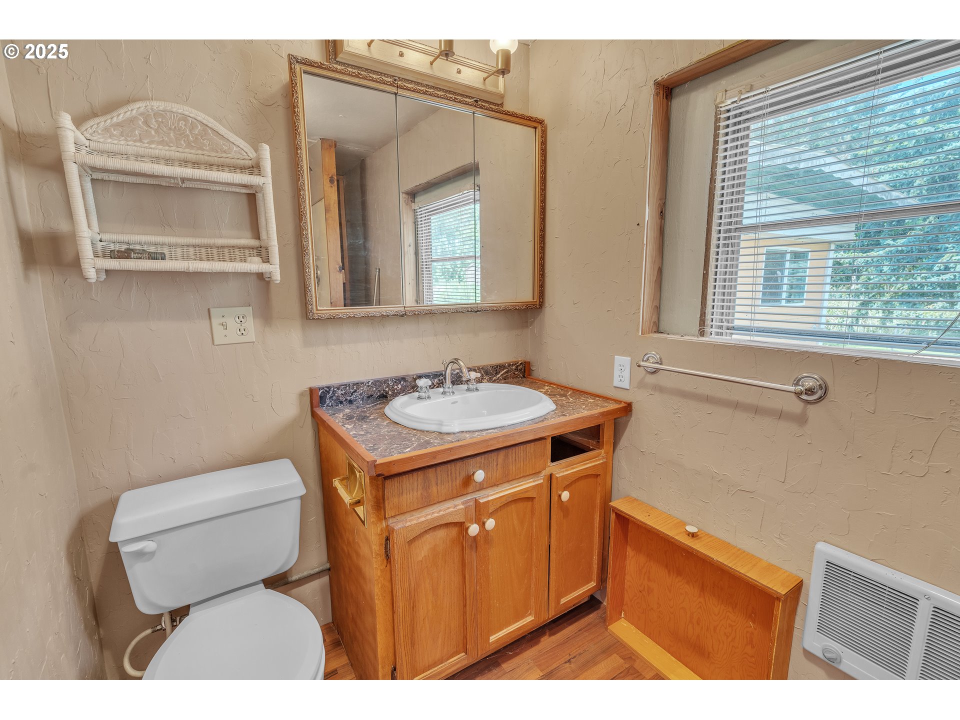 16163 French Prairie Road Northeast Woodburn, OR 97071 - Photo 40 of 47 a bathroom with a sink a toilet and a mirror