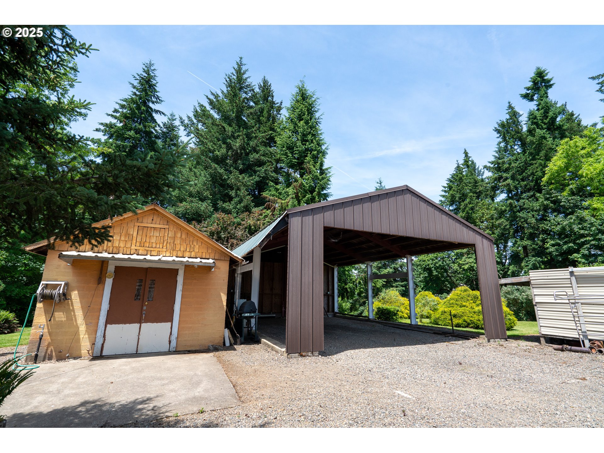 16163 French Prairie Road Northeast Woodburn, OR 97071 - Photo 45 of 47 a front view of a house with garden