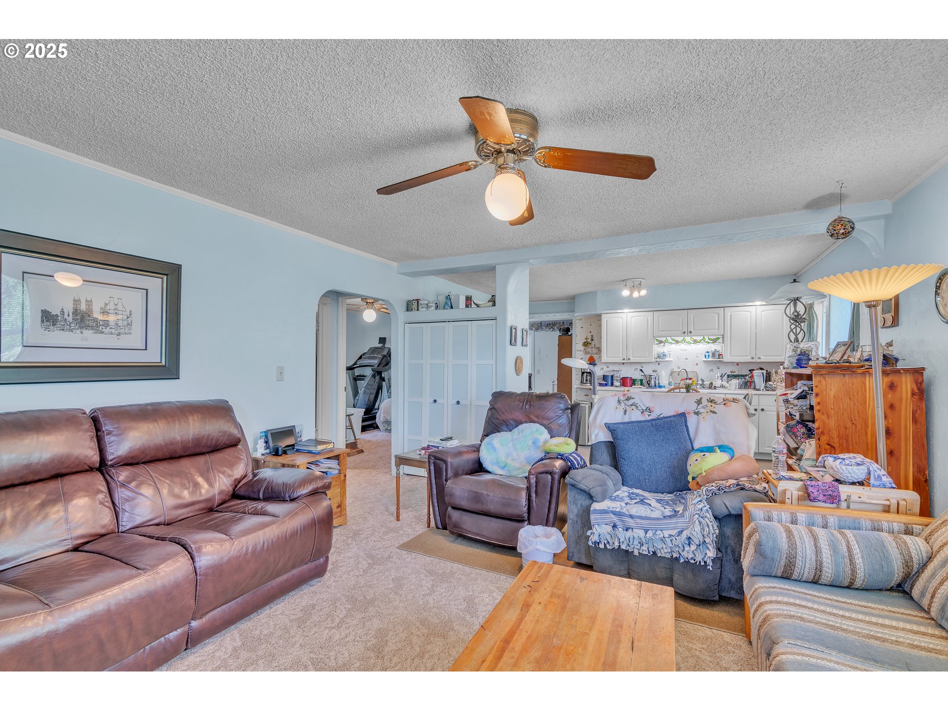16163 French Prairie Road Northeast Woodburn, OR 97071 - Photo 5 of 47 a living room with furniture kitchen view and a chandelier