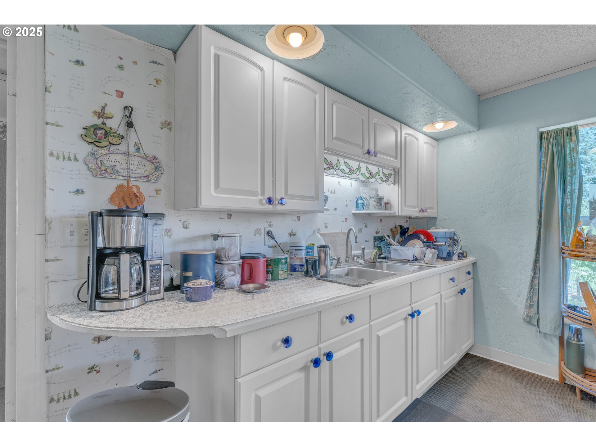 16163 French Prairie Road Northeast Woodburn, OR 97071 - Photo 8 of 47 a kitchen with cabinets and window