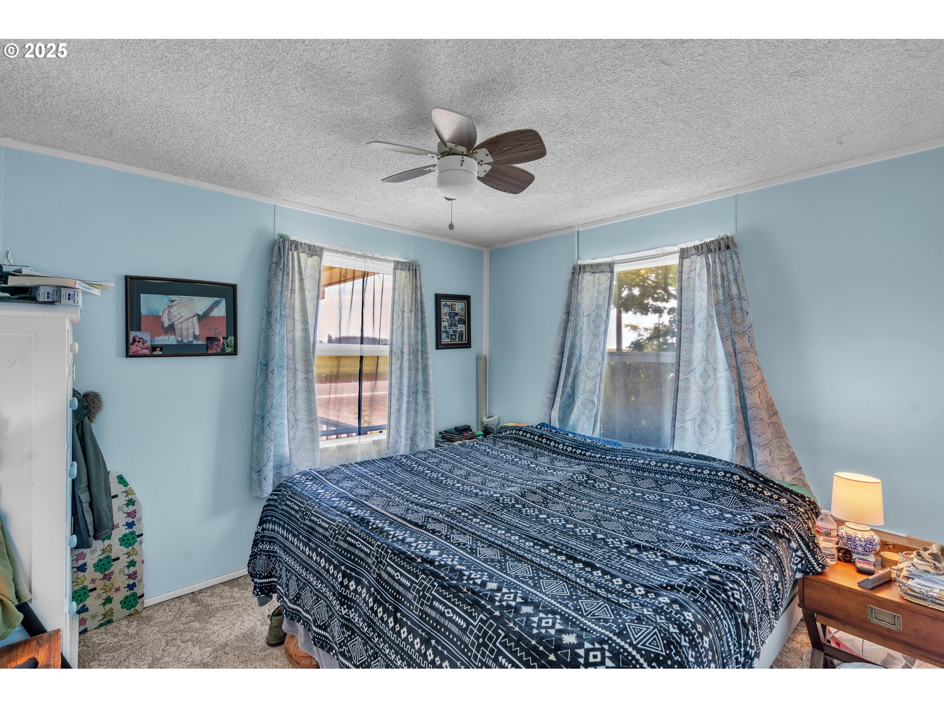 16163 French Prairie Road Northeast Woodburn, OR 97071 - Photo 10 of 47 a bedroom with a bed and a dresser