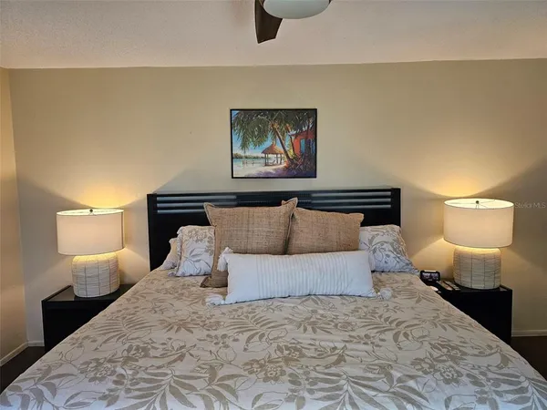 a bathroom with a shower toilet and sink