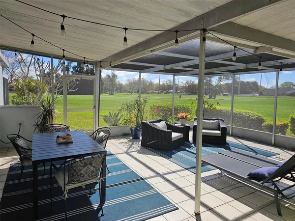 a view of a golf course with a big yard