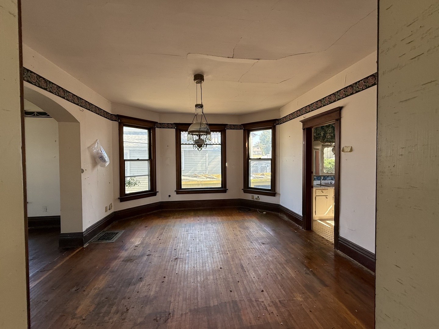412 West Elm Street Sycamore, IL 60178 - Photo 12 of 35 a view of an empty room with wooden floor and a window