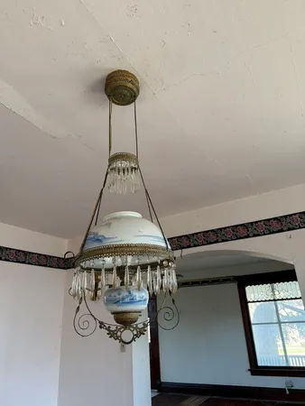 a kitchen with granite countertop a sink stainless steel appliances and cabinets