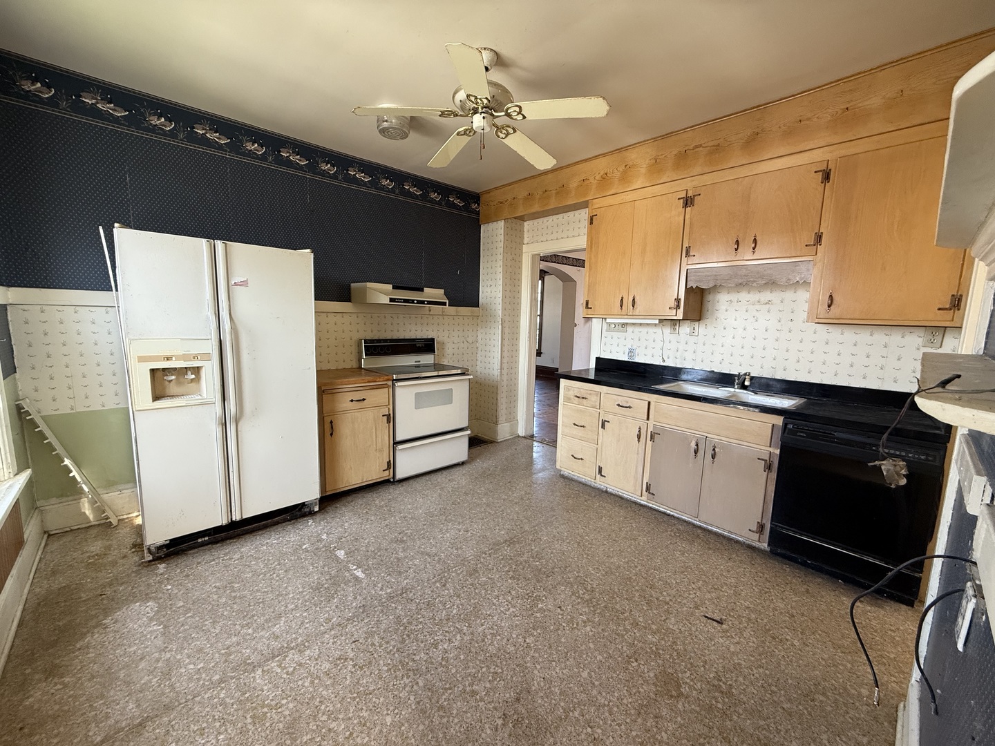 412 West Elm Street Sycamore, IL 60178 - Photo 15 of 35 a kitchen with granite countertop a sink stainless steel appliances and cabinets