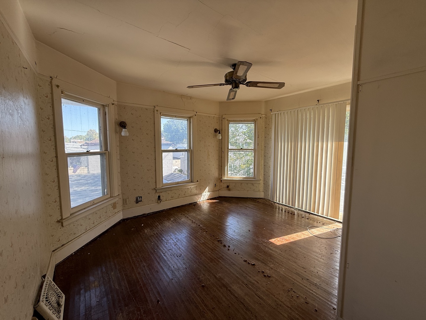 412 West Elm Street Sycamore, IL 60178 - Photo 23 of 35 a view of an empty room with wooden floor and a window